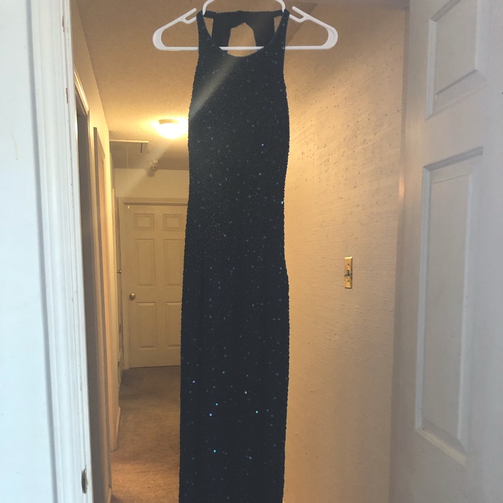 Beautiful Scala evening gown in dark teal. Just in time for the season!